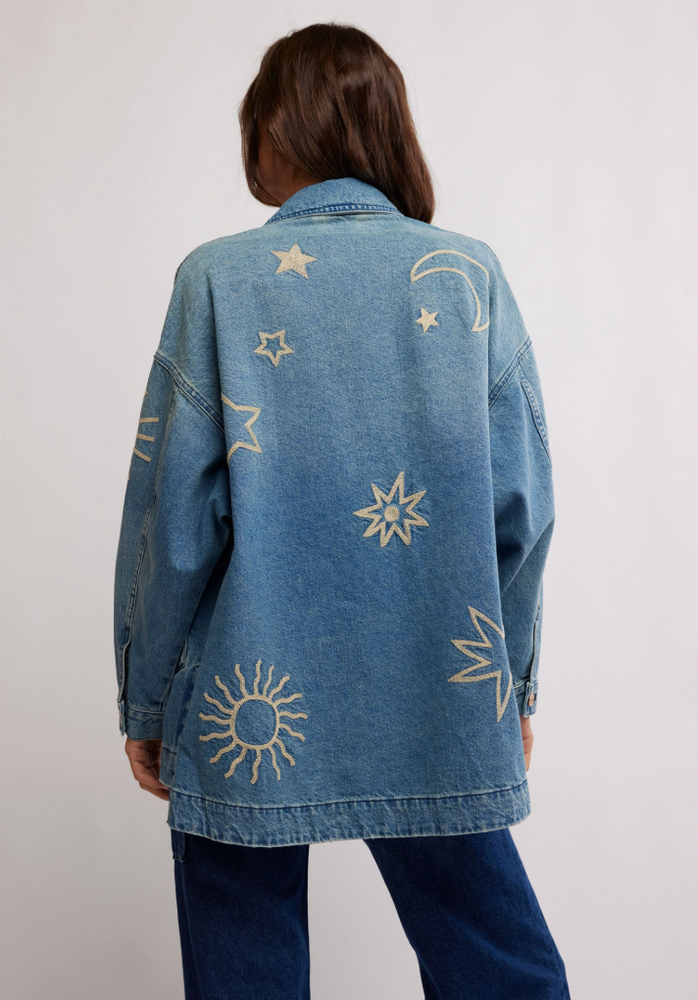 
                      
                        Women's oversized, embroidered denim jacket from Free People. 
                      
                    