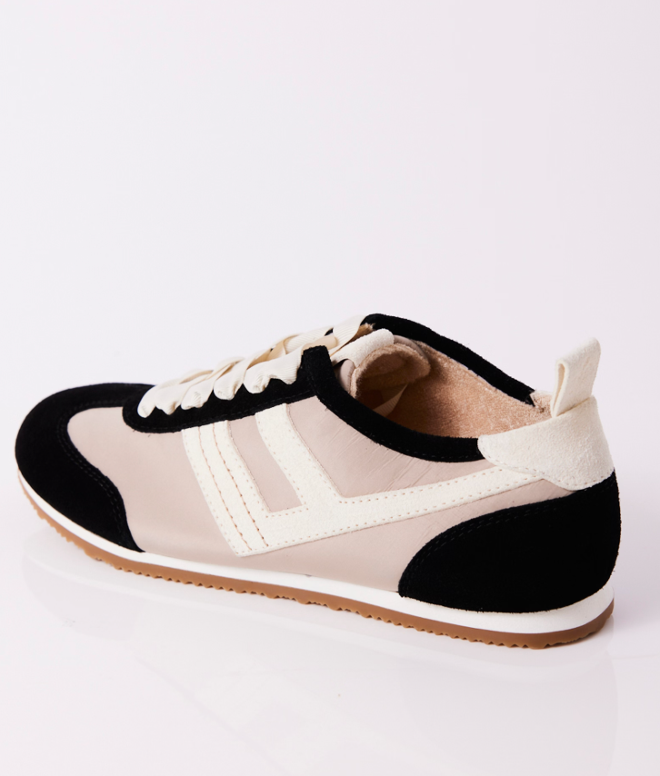 
                      
                        The Free People Aces Tennis Shoes features a convenient pull tab 
                      
                    