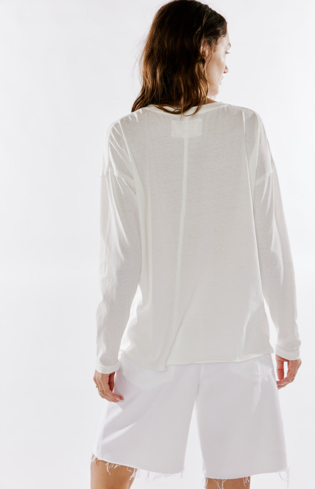 
                      
                        Women's long sleeve white t-shirt with exposed seaming from Free People
                      
                    