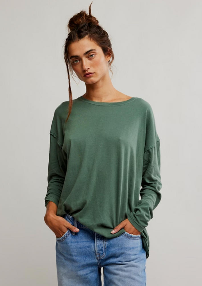 
                      
                        The green Nina Long Sleeve Tee by Free People
                      
                    