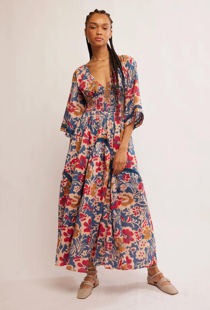 
                      
                        Women's multicolor floral billowy maxi dress with a cinched waist and v-neckline
                      
                    