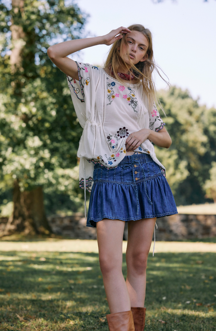 Free People's Roselle Denim Mini Skirt is a closet staple with endless ways to style. Find it at Harbour Thread!