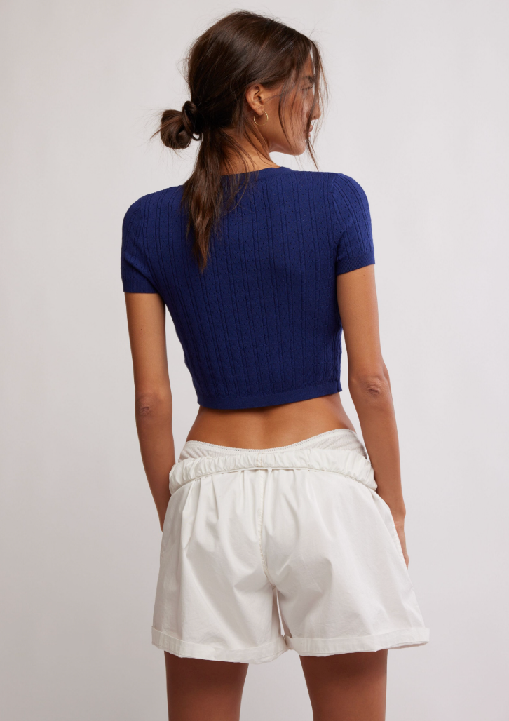 Women's short sleeve fitted pointelle knit cardigan from Free People. 