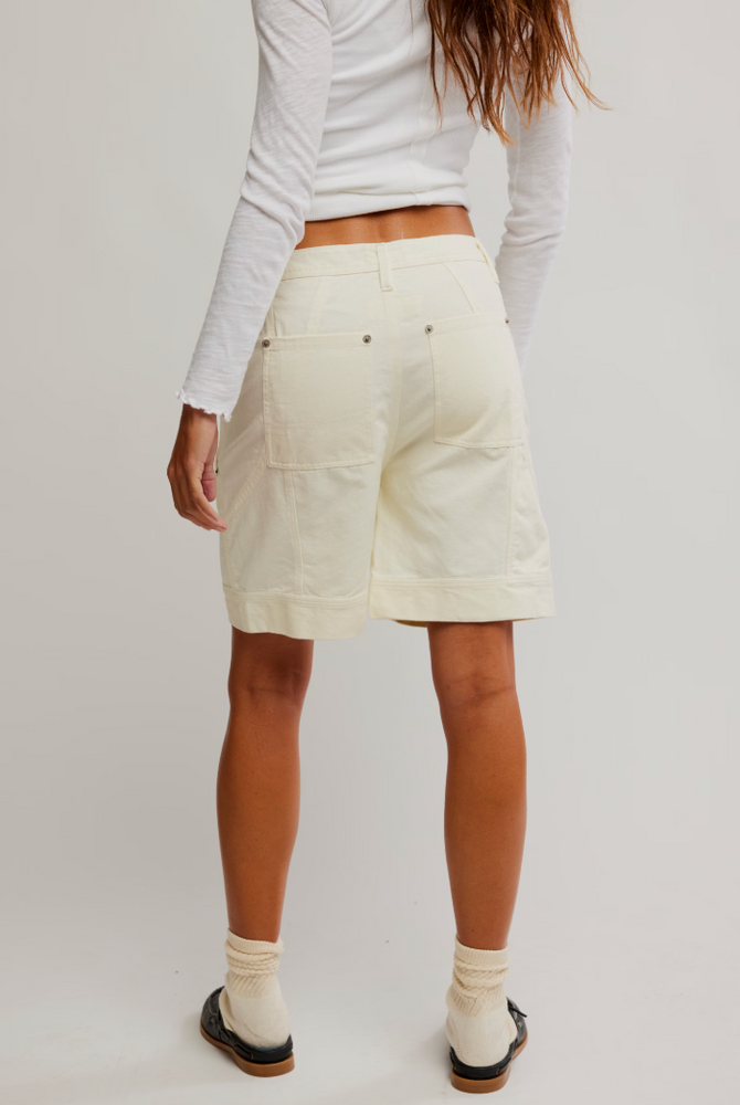 
                      
                        Women's long white shorts
                      
                    