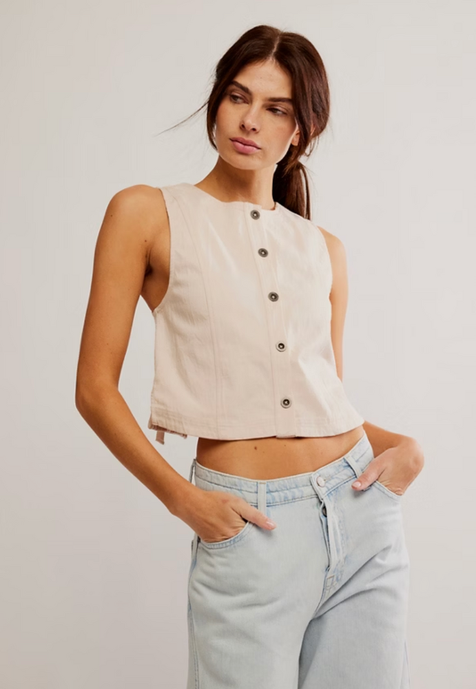 Classic meets contemporary with Free People's crisp cotton twill Blake Vest, featuring a high neckline and open back. Available now at Harbour Thread