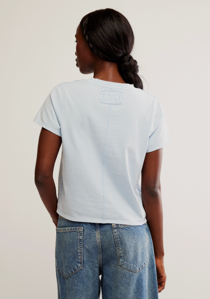
                      
                        Women's light blue boxy fit short sleeve t-shirt from Free People
                      
                    