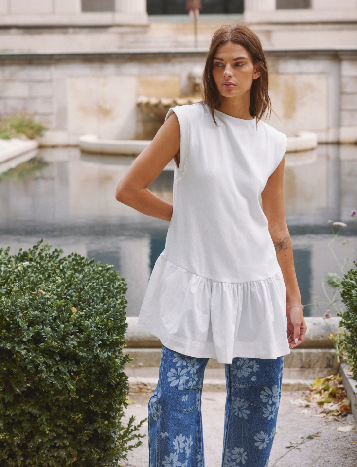 
                      
                        Versatile white mini dress from Free People
                      
                    