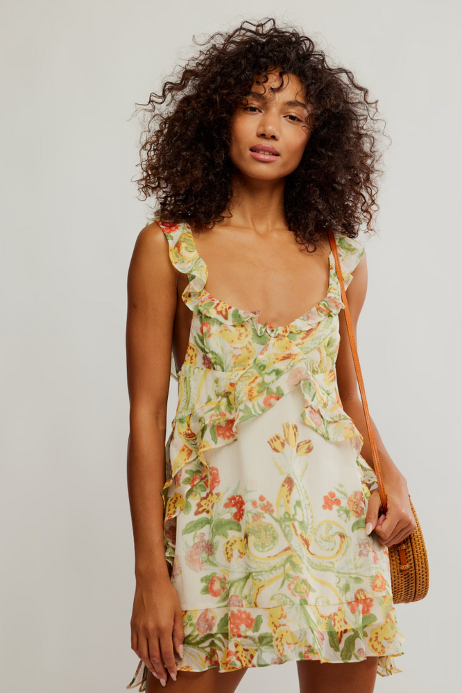 The Free People Bali Flora Mini Dress offers feminine florals and ruffle details. Find it at Harbour Thread boutique in Burlington, VT. 