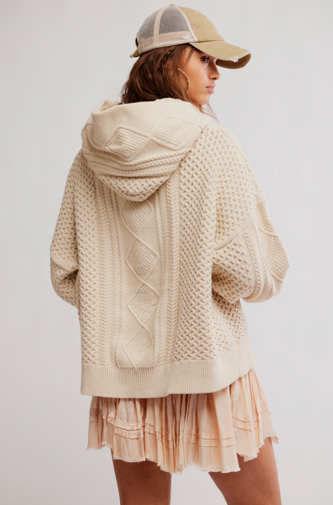 
                      
                        Women's neutral color cable knit hoodie
                      
                    