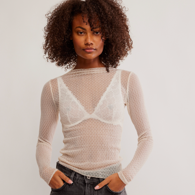 
                      
                        The Free People Minding My Business Top in the color Tea.
                      
                    