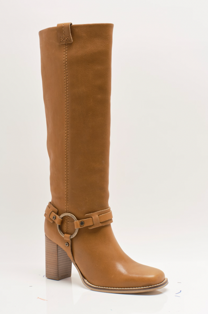 
                      
                        The Free People Heidi Harness Tall Boot is available at Harbour Thread boutique in the color Toffee Leather
                      
                    