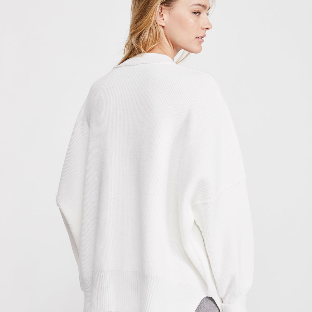 
                      
                        Back view of the White Easy Street Tunic by Free People
                      
                    