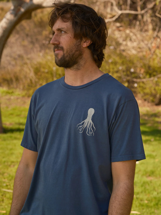 Front view of men's navy color short sleeve t-shirt with a small octopus graphic on the left chest