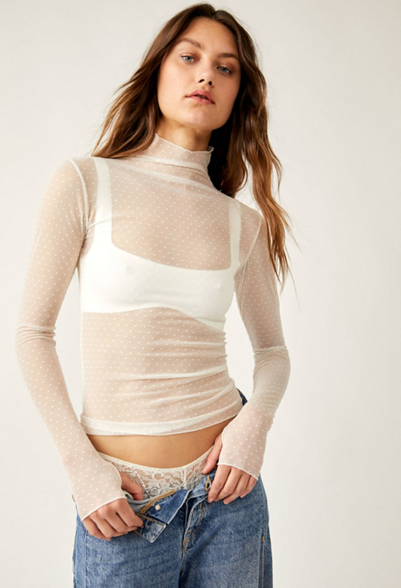 Front view of the Love Dove On The Dot Layering Top by Free People