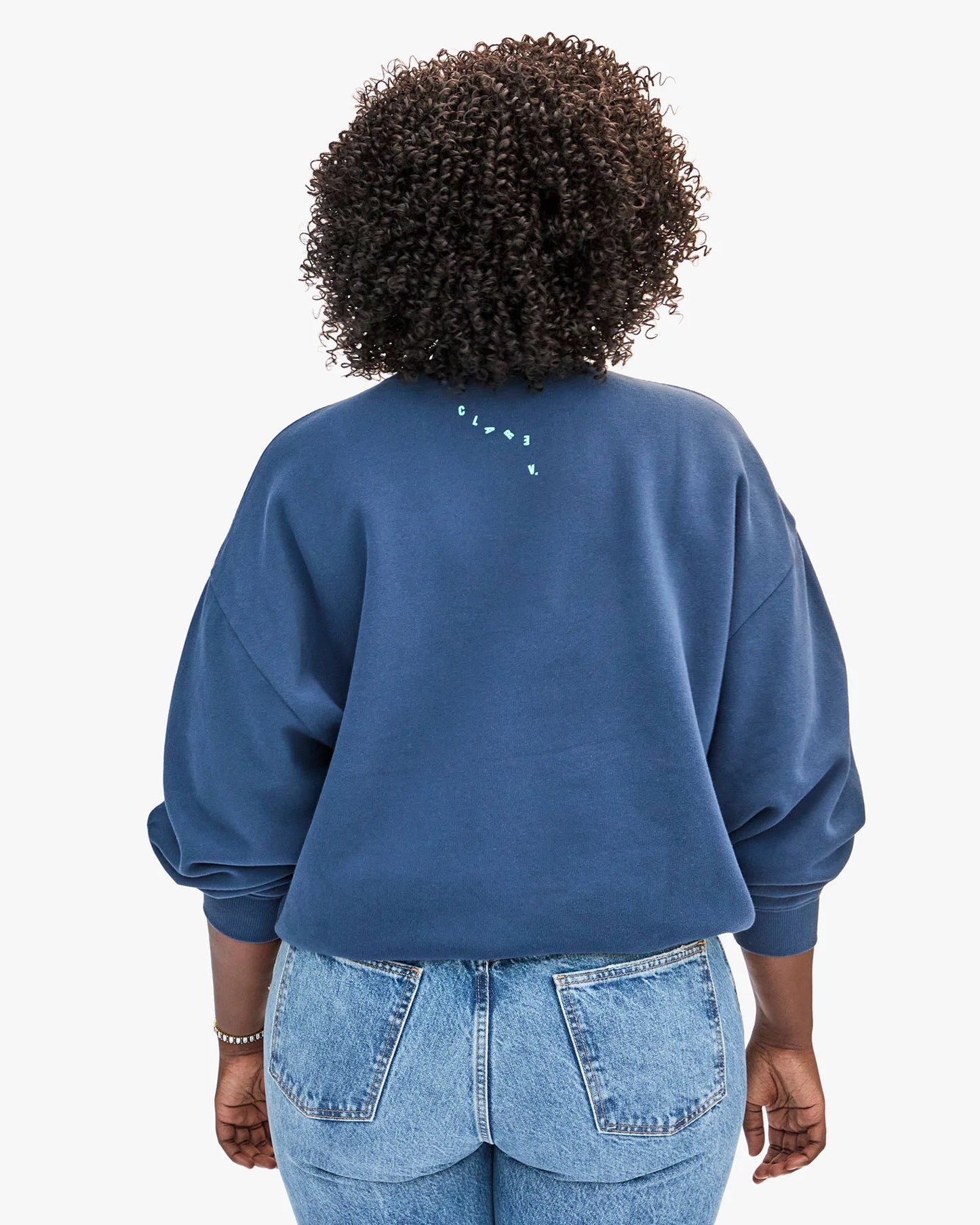 The Oversized Sweatshirt from Clare V. features letters from the brand name subtly cascading down the back neck