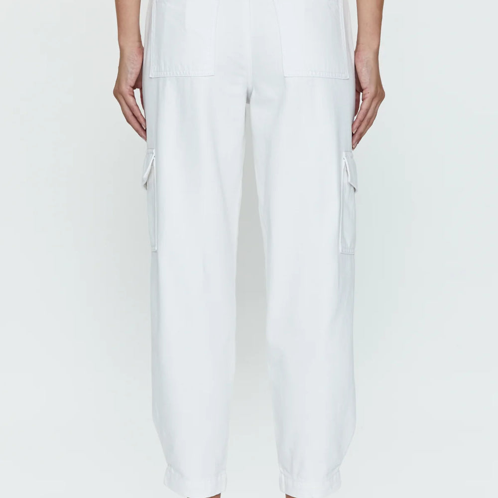 
                      
                        Back view of woman wearing sleek white cargo pants with a high rise and tapered ankle hem
                      
                    