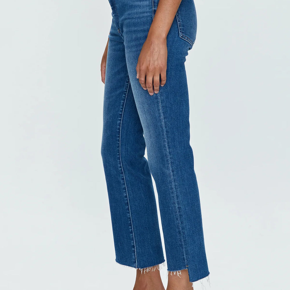 
                      
                        Side view of woman wearing medium wash high rise cropped bootcut jeans by Pistola
                      
                    