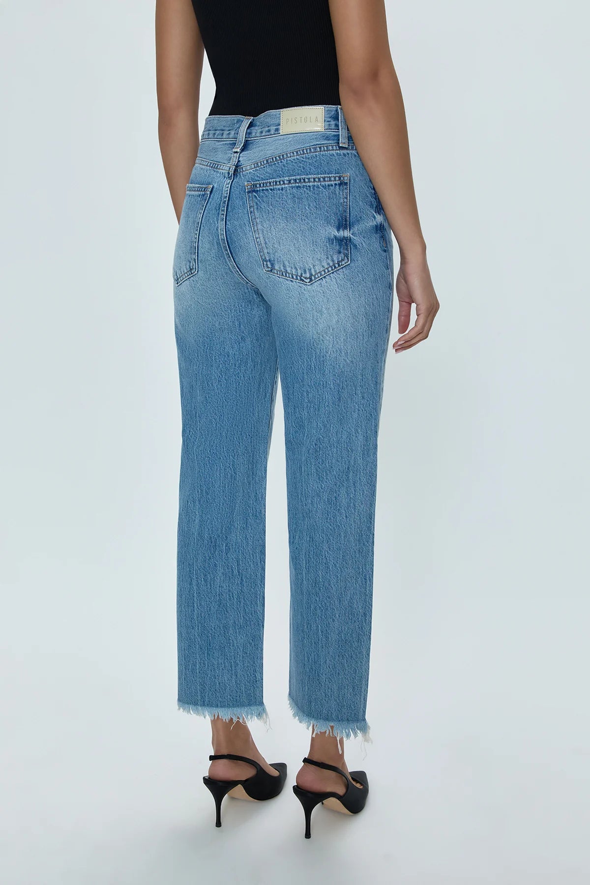 These women's jeans offer a super high rise, straight leg silhouette and cropped hem