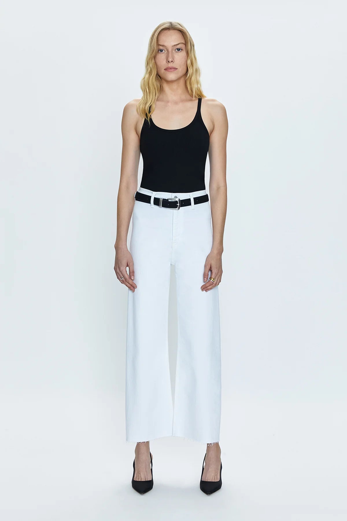Front view of a woman wearing the white Penny High Rise Wide Leg Crop  Jean by Pistola
