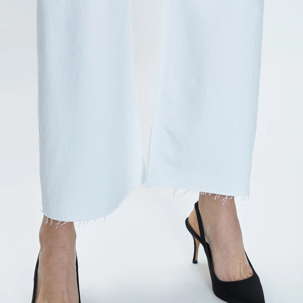 
                      
                        Close up view of the bottom hem on a pair of white denim HIgh rise wide leg jeans
                      
                    