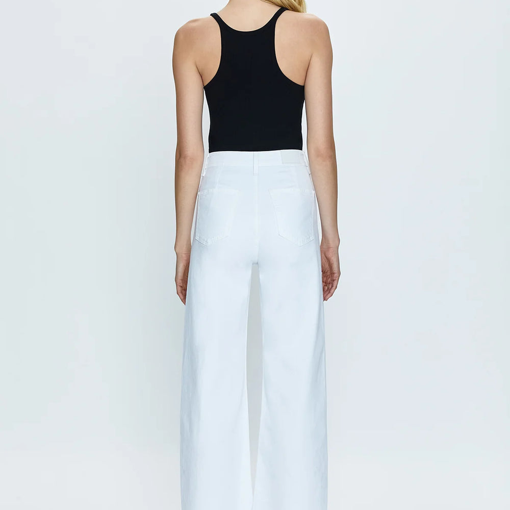 Back view of a woman wearing the white Penny High Rise Wide Leg Crop Jean by Pistola