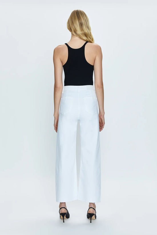 Back view of a woman wearing the white Penny High Rise Wide Leg Crop Jean by Pistola