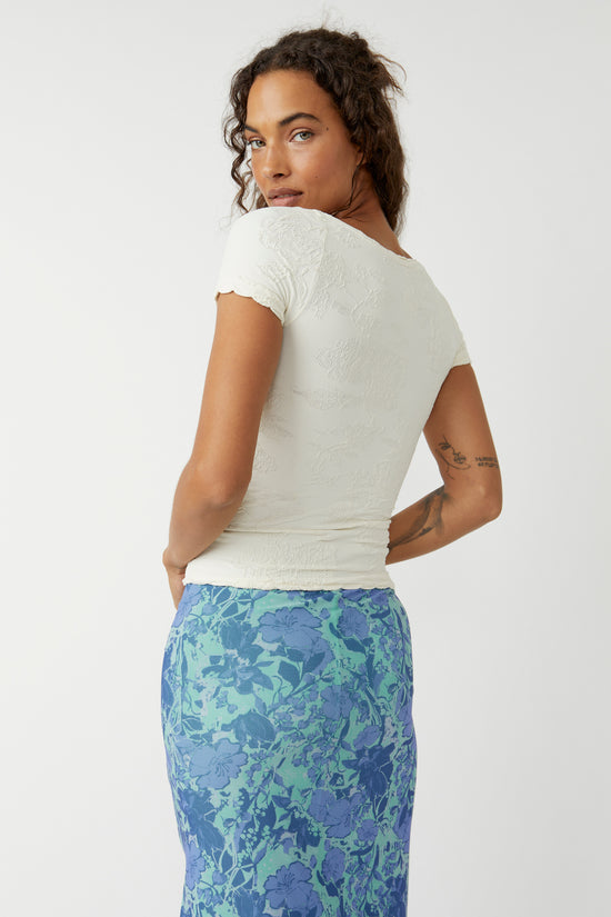 Back view of the Free People Send Love Seamless Tee in the color Ivory