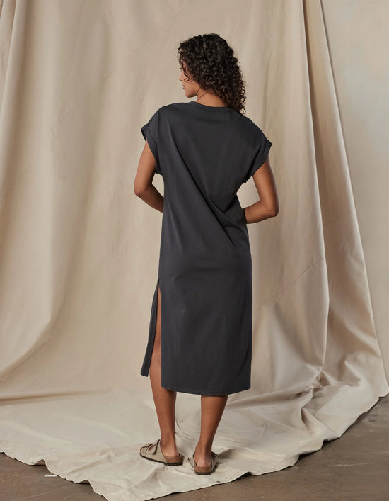 Back view of The Normal Brand's Lennox Jersey Midi T-Shirt Dress in the color Phantom