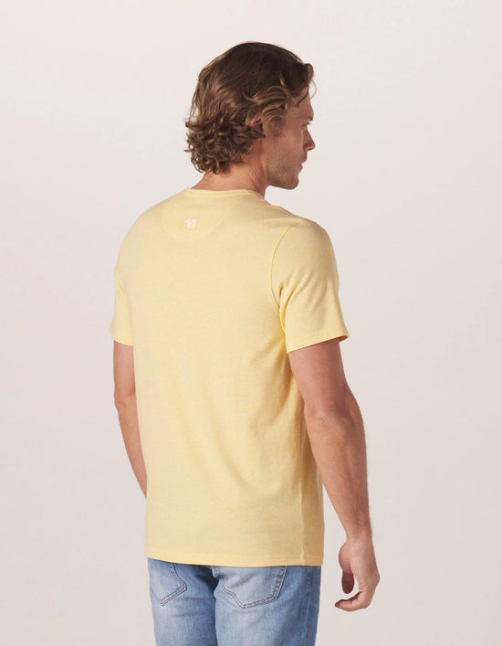Back view of The Normal Brand's Active Puremeso Weekend Henley in the color Golden Hour