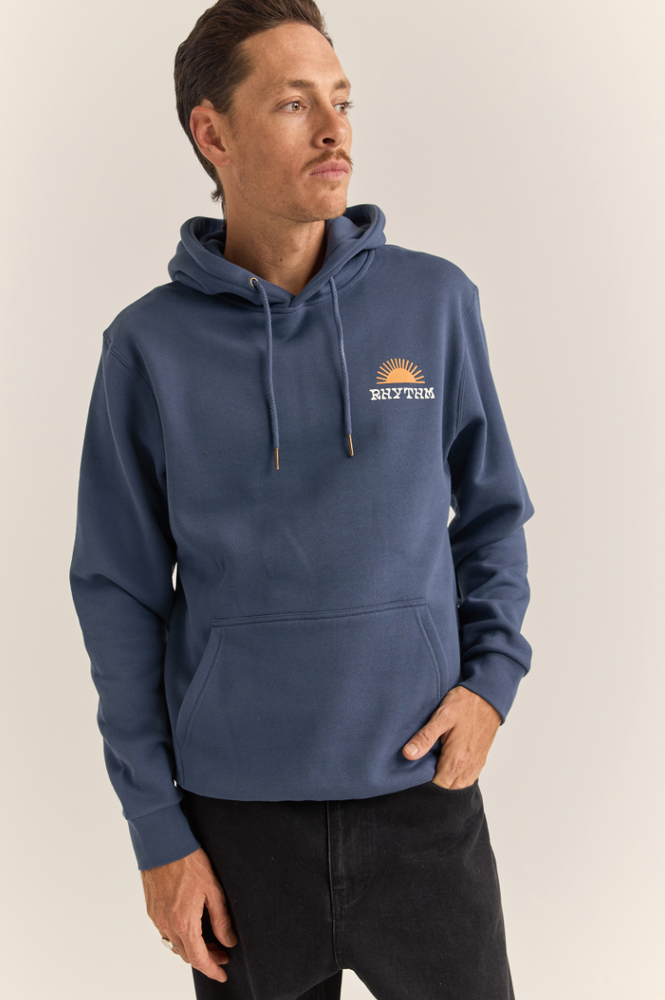 When you need a little extra warmth as the seasons transition, throw on the comfortable Awake Fleece Hooded Sweatshirt from Rhythm, available at Harbour Thread. 
