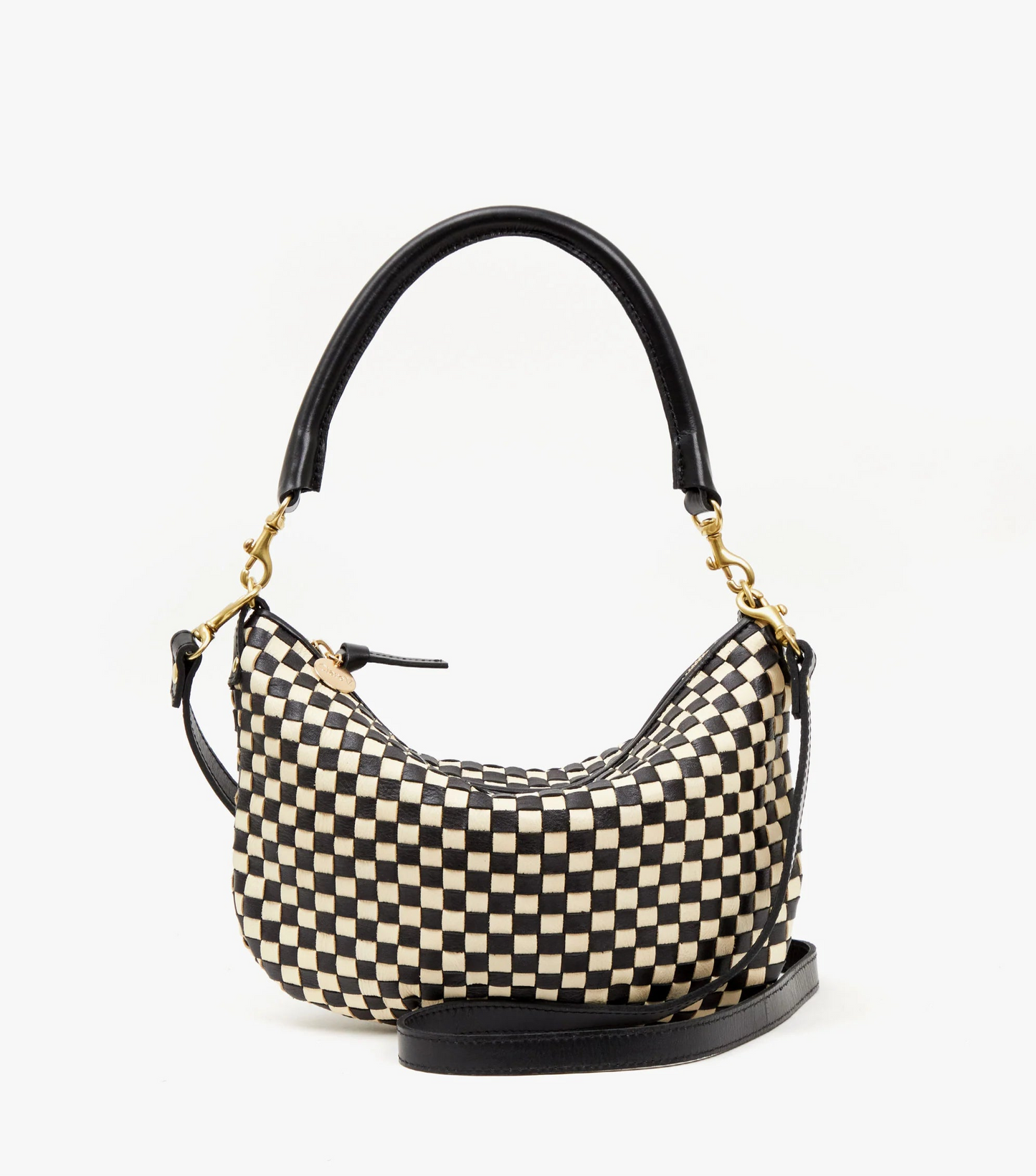 The Black and Cream Woven Checker Petit Moyen bag by Clare V. offers versatile accessory style. 