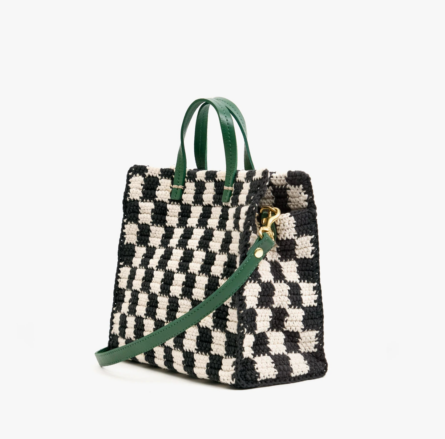Clare V. black and white crochet tote with green leather straps