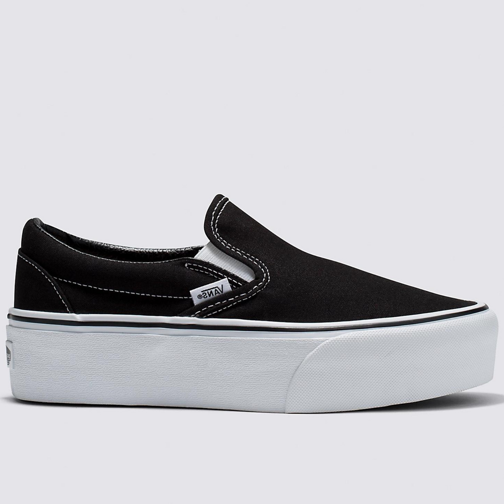 
                      
                        Side profile view of Vans Classic Slip-On Stackform Sneaker in Black/True White
                      
                    