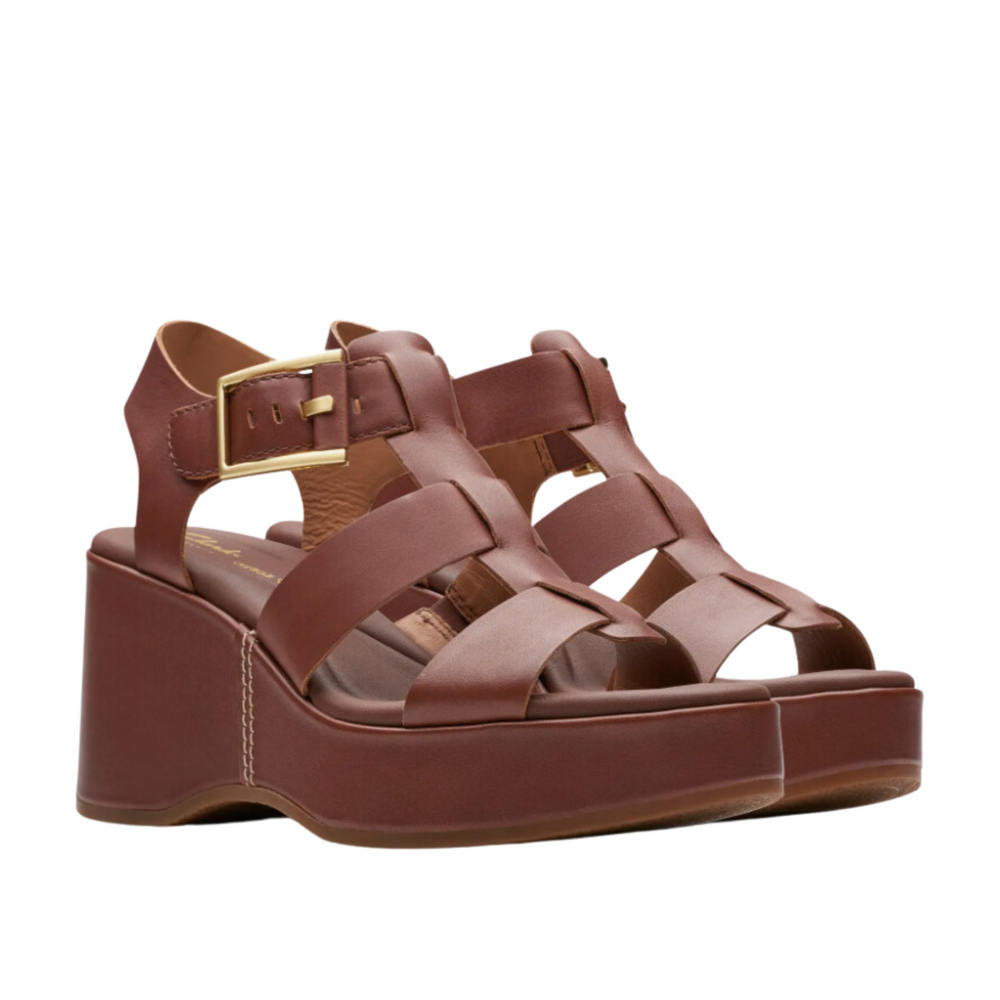 
                      
                        The tan leather Manon Cove Wedge Sandals from Clarks
                      
                    