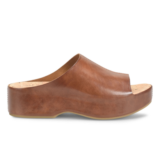 Side view of women's brown leather flatform slide sandal by Kork-Ease