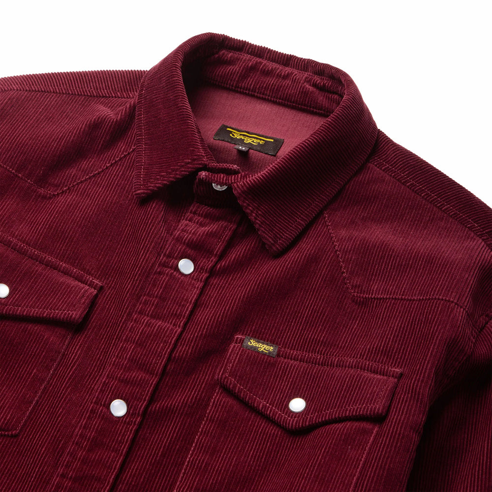 
                      
                        Collar, pearl snap button and chest pocket detail on the Reagan Pearl Snap Corduroy Shirt in the color Vino by the brand Seager
                      
                    