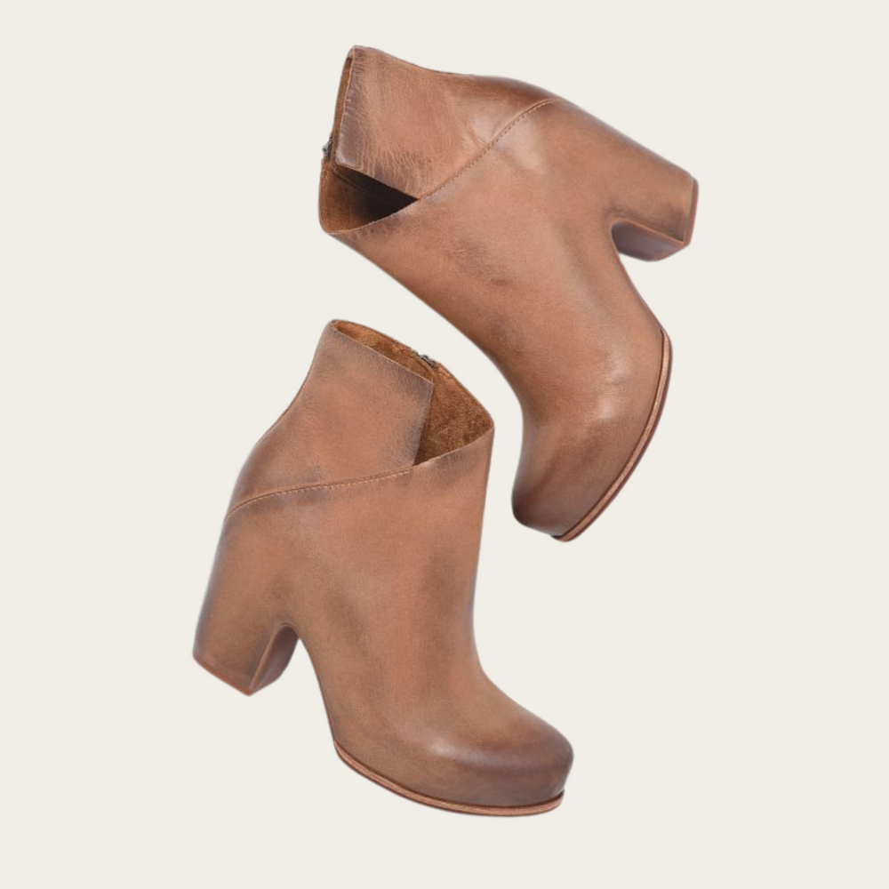 
                      
                        The brown leather Seeley Boot by Kork-Ease is wrapped in leather from top to bottom
                      
                    