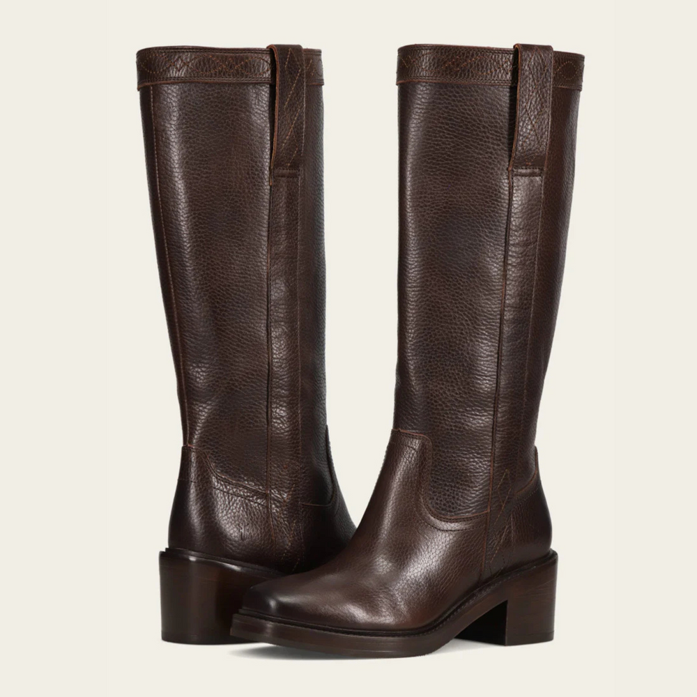 
                      
                        A pair of women's dark brown leather pull on riding boots from FRYE
                      
                    