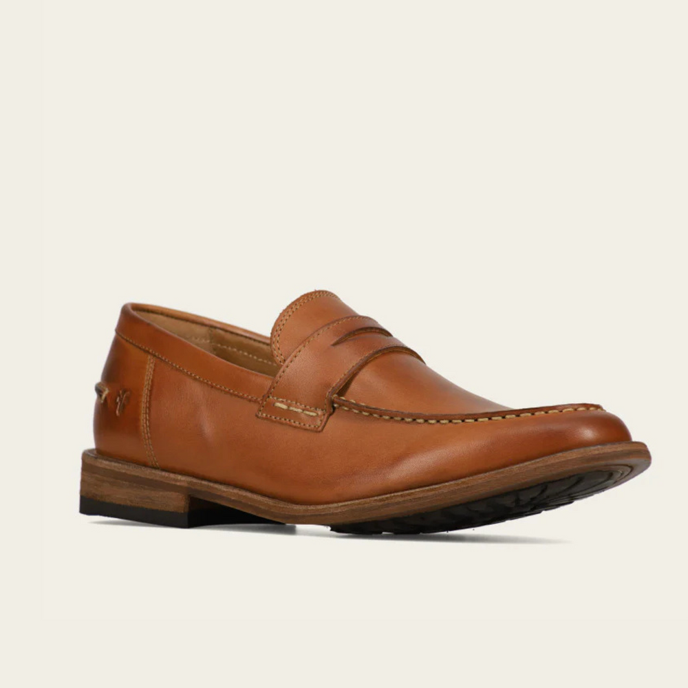 For classic footwear style that elevates any outfit, shop the FRYE Tyler Flex Penny Loafer, available now at Harbour Thread in Burlington, VT.