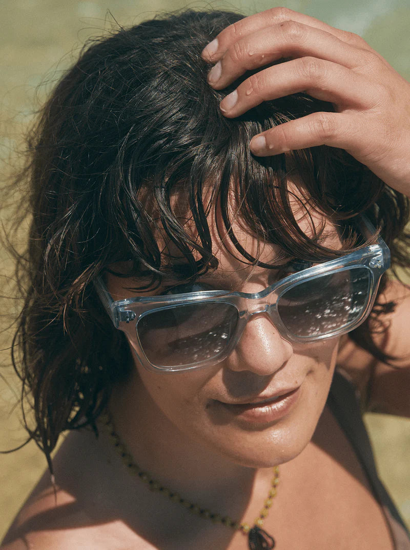 A woman wearing the Breya Women's Square Sunglasses