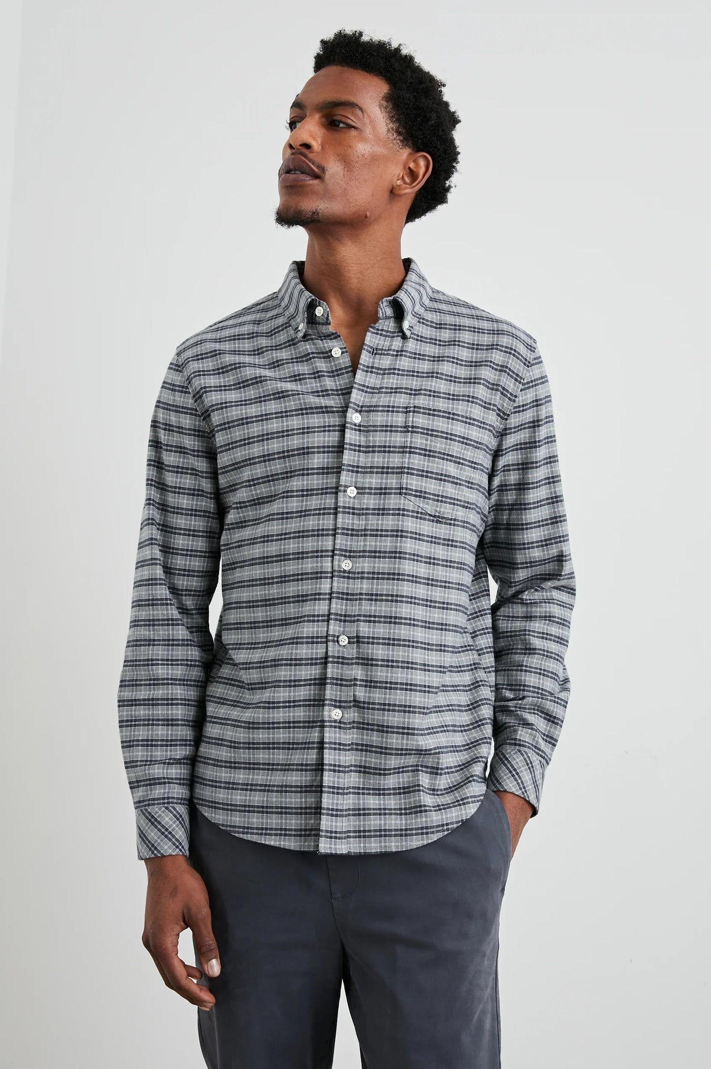 Front view of a man wearing the Reid Button Down Shirt by Rails