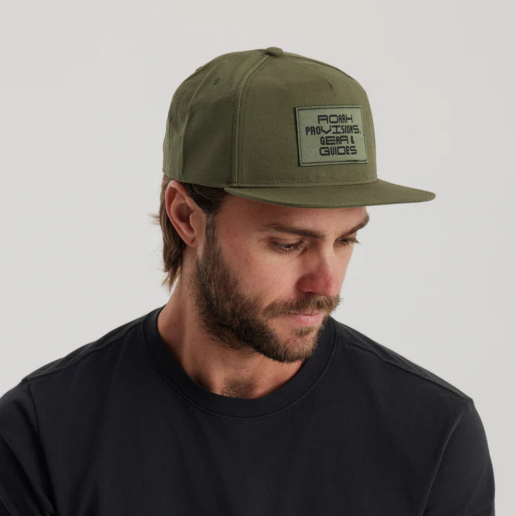 
                      
                        Man wearing the Provision Green Station Snapback Hat by Roark
                      
                    