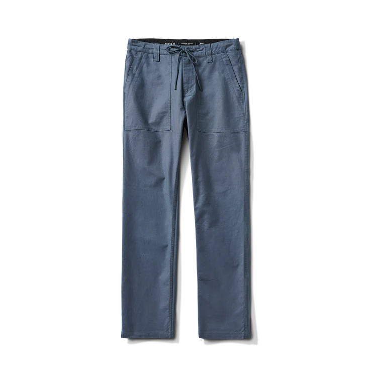 
                      
                        The Layover Utility Pants by Roark in the muted blue color Orion
                      
                    