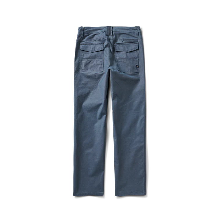 
                      
                        Back view of the Layover Utility Pants by Roark in the muted blue color Orion
                      
                    