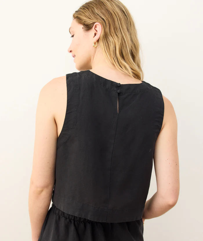 The Marine Layer Quinn Linen Tank offers a relaxed fit with back button closure.