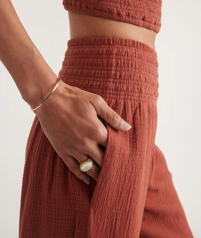 
                      
                        Side design detail on Marine Layer's Sophia Double Cloth Palazzo Pant in the color Rust
                      
                    