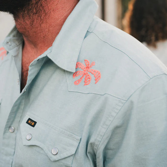 Design detail on the Howler Bros Crosscut Deluxe Short Sleeve Shirt in Fronds