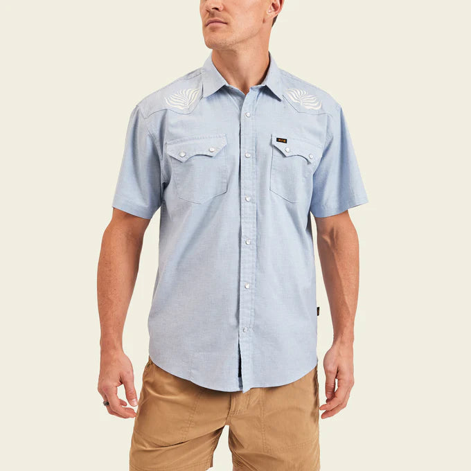 Front view of man wearing the Crosscut Deluxe Short Sleeve Shirt by Howler Bros