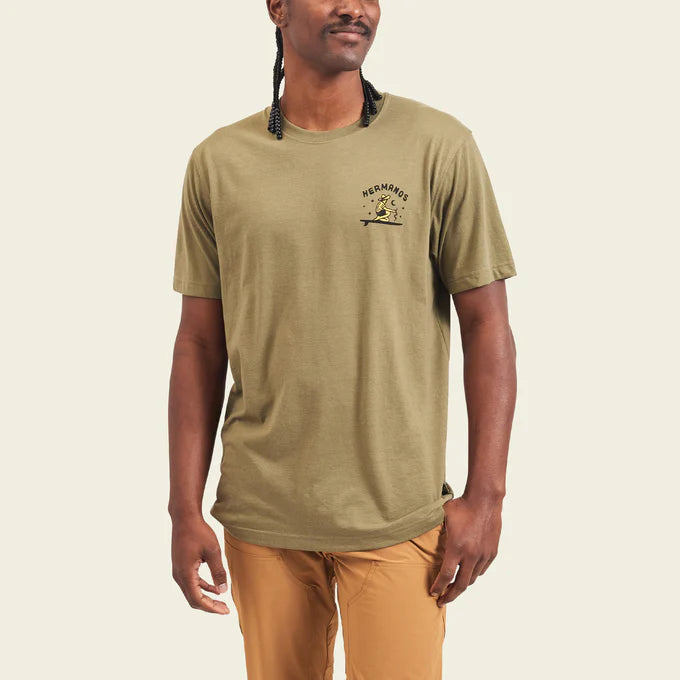 Front view of man wearing the green Ocean Offerings Men's T-shirt by Howler Bros