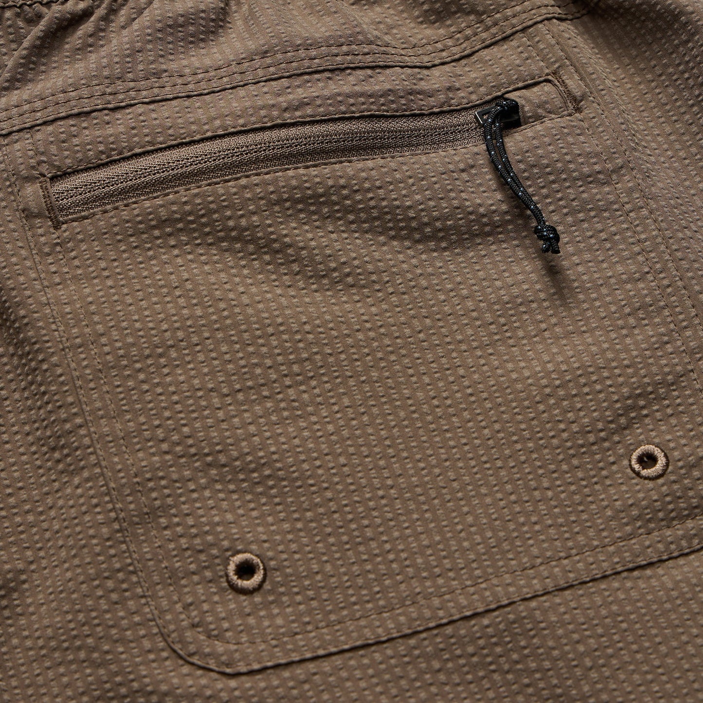 The Howler Bros Salado Shorts feature a back zip pocket